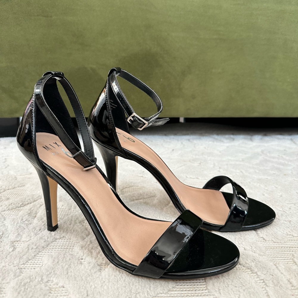 Single strap black heels